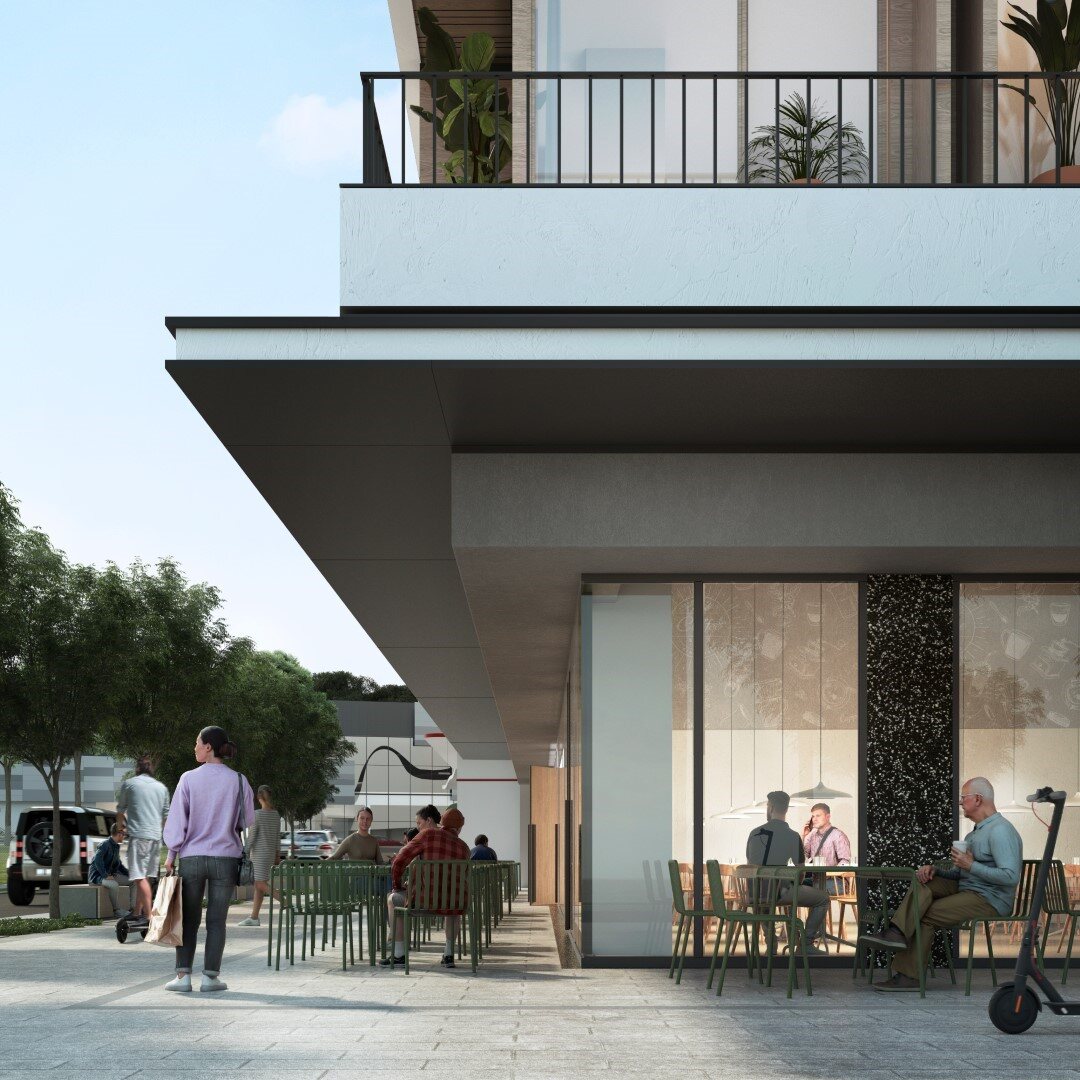 Fachada de Nook Residence con terraza y personas sentadas al aire libre.